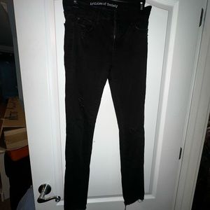 Articles of Society Black distressed skinny jeans.